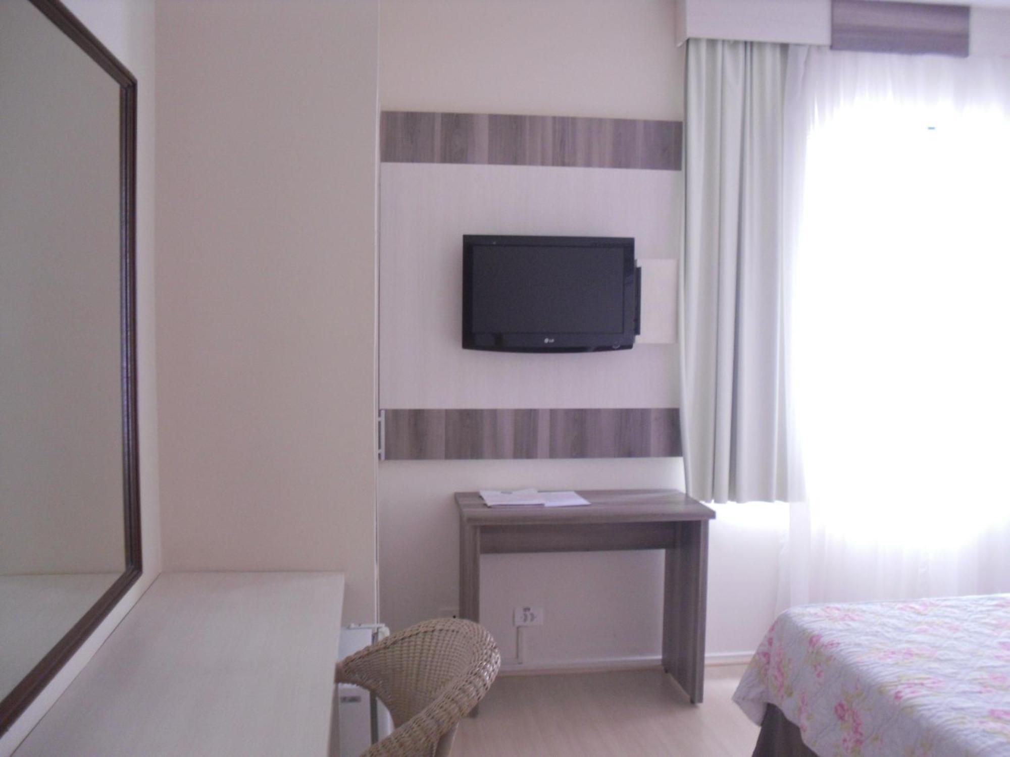 Hotel CHA Prime Curitiba Habitación foto